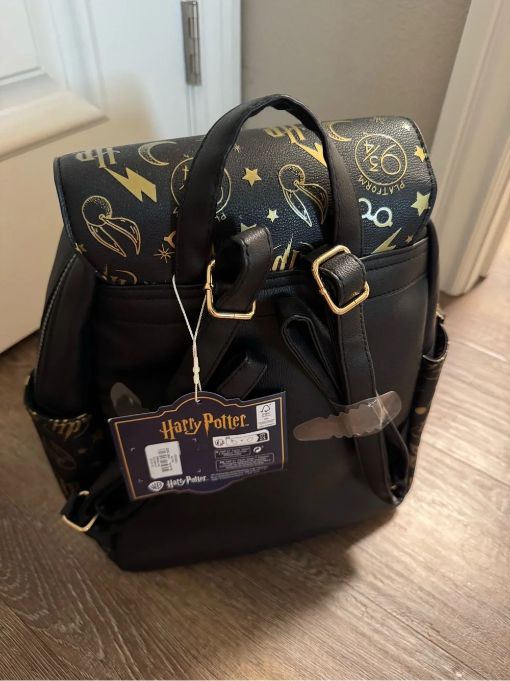 Warner Bros. Harry Potter Black & Gold Emblem Backpack